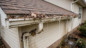 Understanding the Importance of Clearing Clogged Gutters and Downspouts