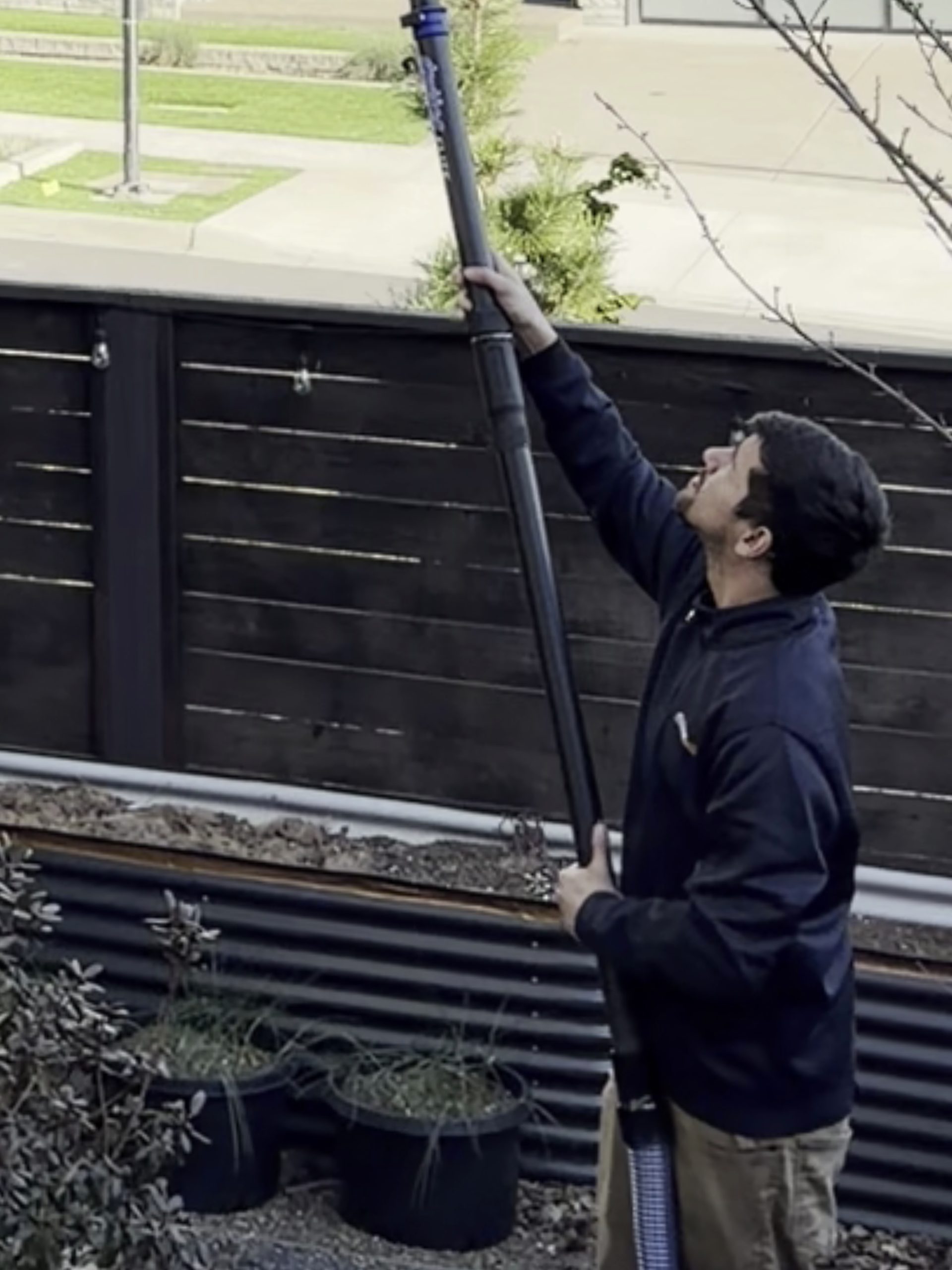 Gutter cleaning on ladder